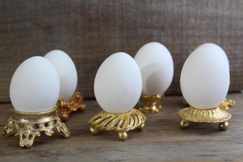 photo of vintage ornamental egg stands, six ornate gold tone metal egg holders #4