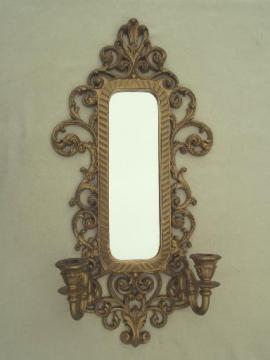 catalog photo of vintage ornate gold  Syroco style plastic frame mirror w/ candle sconces