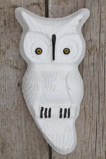 photo of vintage owls industrial style wall art pieces, cast cement sculptures in retro colors #2