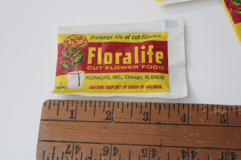 photo of vintage packaging, sealed packets of florist flowers preserver, Floralife red rose graphics #2