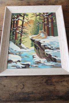 vintage paint by number picture, cougar or mountain lion winter creek north woods snow