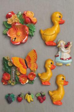 catalog photo of vintage painted chalkware plaques, retro kitchen wall art lot, bright fruit, ducks in a row etc.