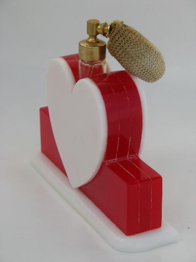 photo of vintage perfume spray atomizer, red and white plastic heart vanity bottle #2