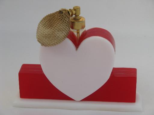 photo of vintage perfume spray atomizer, red and white plastic heart vanity bottle #3