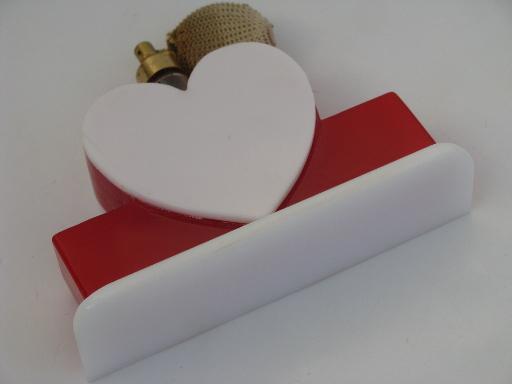 photo of vintage perfume spray atomizer, red and white plastic heart vanity bottle #4