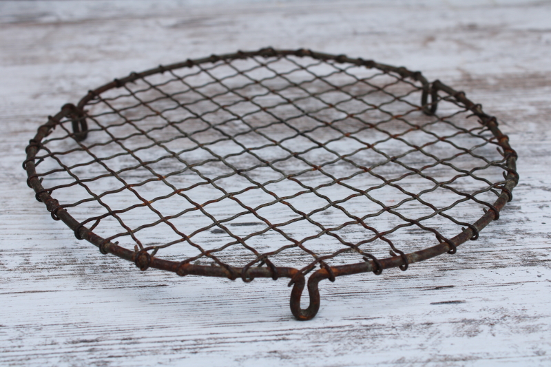 photo of vintage pie or cake cooling rack, little round stand wavy crimped wire w/ feet, baking photo prop  #2