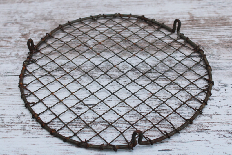 photo of vintage pie or cake cooling rack, little round stand wavy crimped wire w/ feet, baking photo prop  #4