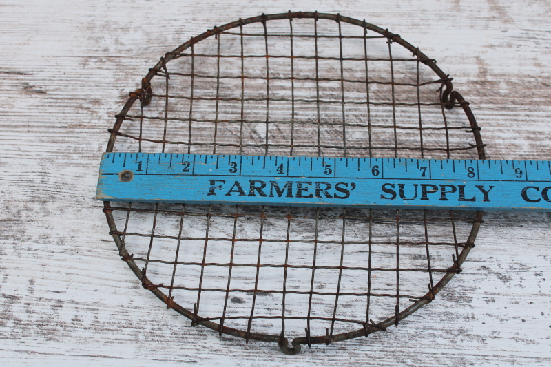 photo of vintage pie or cake cooling rack, little round stand wavy crimped wire w/ feet, baking photo prop  #5