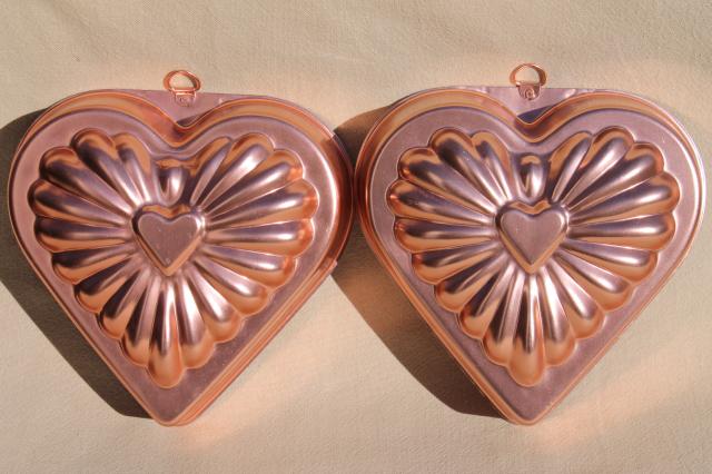 photo of vintage pink aluminum copper jello molds, decorative wall hangers kitchen food mold collection #3