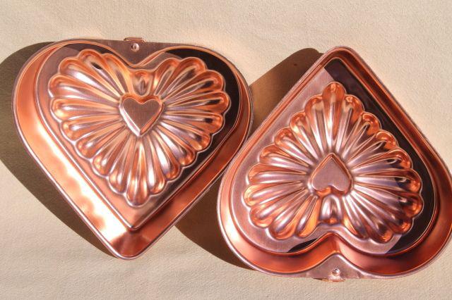 photo of vintage pink aluminum copper jello molds, decorative wall hangers kitchen food mold collection #5