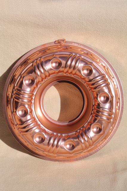 photo of vintage pink aluminum copper jello molds, decorative wall hangers kitchen food mold collection #6