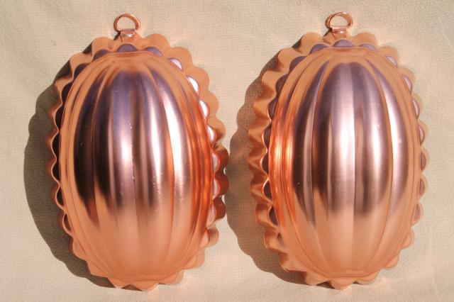 photo of vintage pink aluminum copper jello molds, decorative wall hangers kitchen food mold collection #12