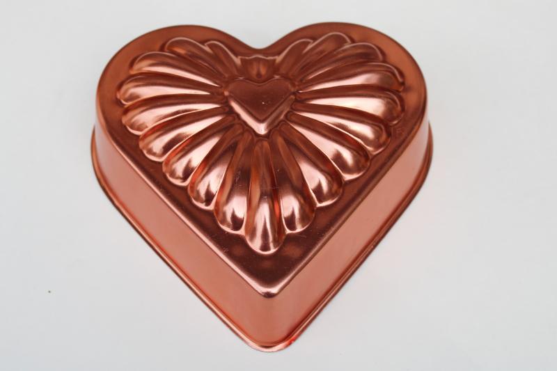 photo of vintage pink copper colored aluminum heart shaped jello mold or cake pan, kitchen wall hanging #1