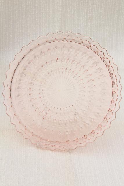 photo of vintage pink depression glass sandwich or cake plate Jeannette holiday buttons and bows pattern #2