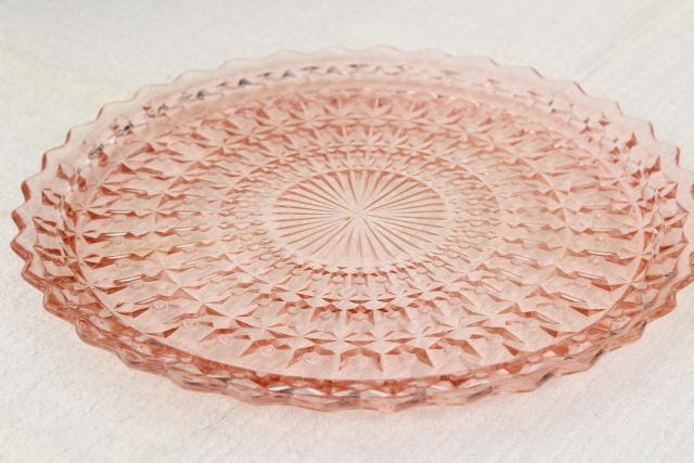 photo of vintage pink depression glass sandwich or cake plate Jeannette holiday buttons and bows pattern #5