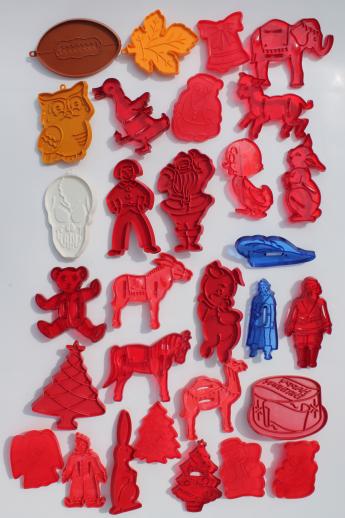 photo of vintage plastic cookie cutter stampers, lot of cookie cutters w/ Robin Hood characters etc. #1