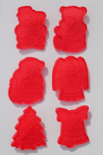 photo of vintage plastic cookie cutter stampers, lot of cookie cutters w/ Robin Hood characters etc. #6