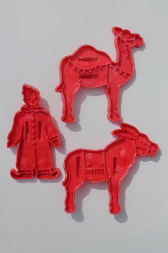 photo of vintage plastic cookie cutter stampers, lot of cookie cutters w/ Robin Hood characters etc. #10