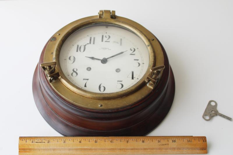 photo of vintage porthole wall clock, solid brass & walnut case, mechanical movement w/ key, Wuersch - Falls River, Mass #6