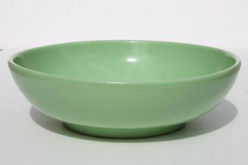 catalog photo of vintage pottery mixing bowl or large salad bowl, retro 1950s mint green color