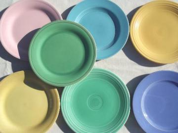catalog photo of vintage pottery plates in pretty pastels, shabby cottage kitchen dishes