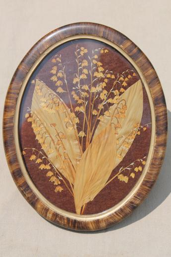 photo of vintage pressed flower picture, collage of dried flowers, lilies of the valley in oval frame #1