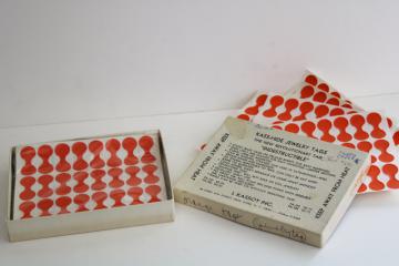 catalog photo of vintage price tag label stickers for jewelry chains, Kass Hide new old stock fold over dots 