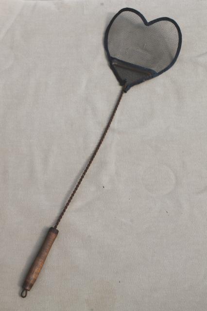 photo of vintage primitive heart fly swatter, old wood handle w/ wire window screen heart #1