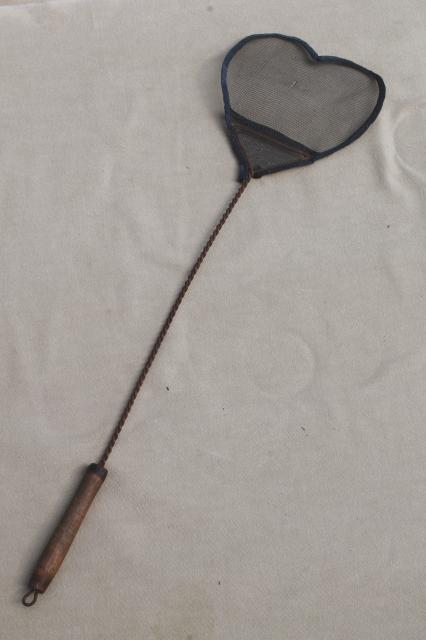 photo of vintage primitive heart fly swatter, old wood handle w/ wire window screen heart #4