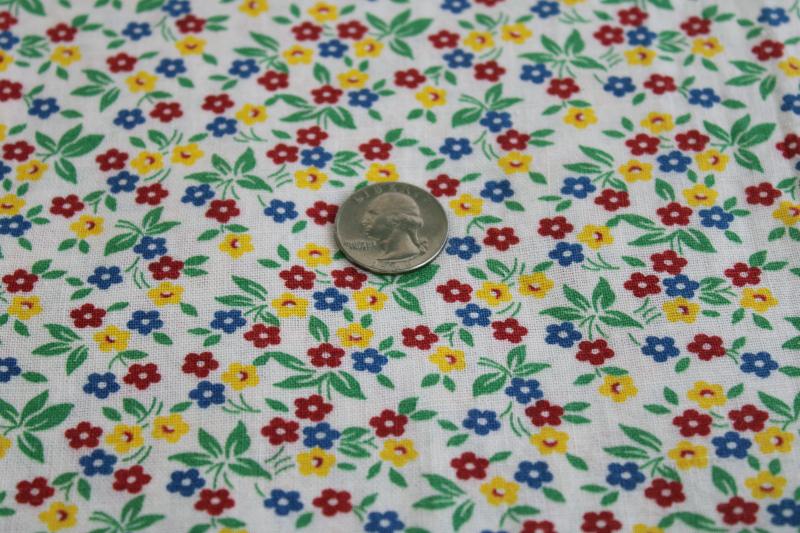 photo of vintage print cotton feed sack fabric, tiny flowers in primary red, blue, yellow #1