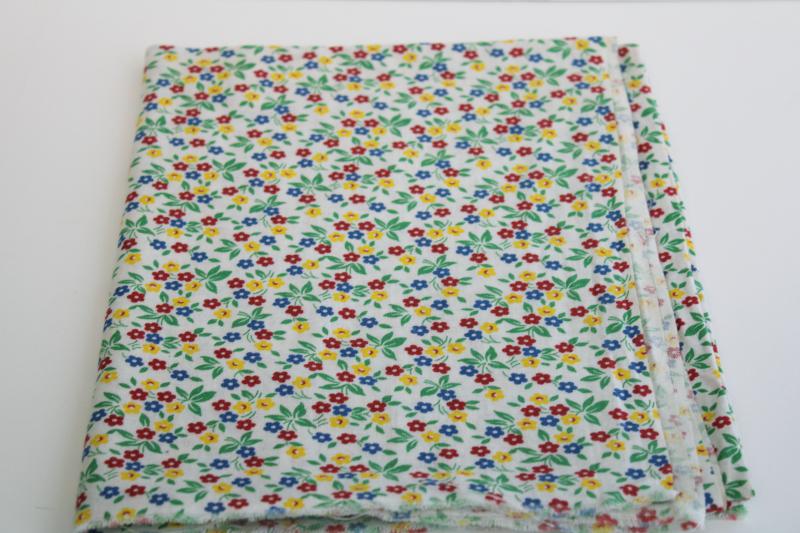 photo of vintage print cotton feed sack fabric, tiny flowers in primary red, blue, yellow #2