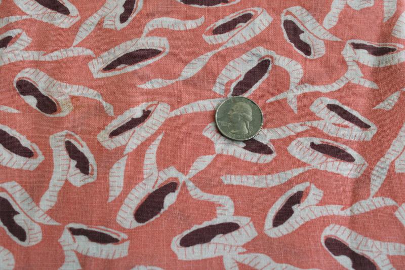 photo of vintage print cotton feedsack fabric, coral pink w/ sewing tape measures #1
