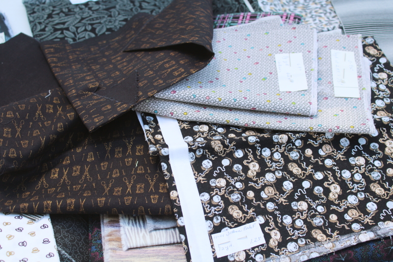 photo of vintage prints quilting cotton fabric, lots of fat quarters small pieces, moody black prints #4