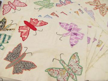 catalog photo of vintage quilt top blocks, hand-stitched patchwork applique butterflies, old cotton print fabric