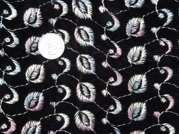 catalog photo of vintage rayon / cotton velvet fabric w/ multi colored embroidery on black