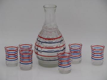 catalog photo of vintage red and blue ring band glass decanter bottle and shot glasses set