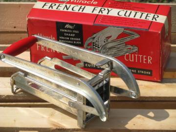 catalog photo of vintage red handled Ekco french fry potato cutter, in original box