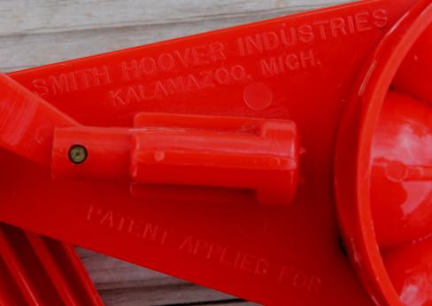 photo of vintage red plastic cherry stoner in original 1940s box, Hoover cherry pitter #3