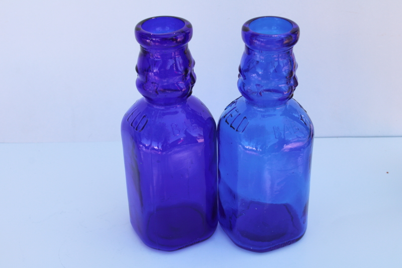 photo of vintage reproduction Brookfield Baby Top antique milk bottles cobalt blue glass #4