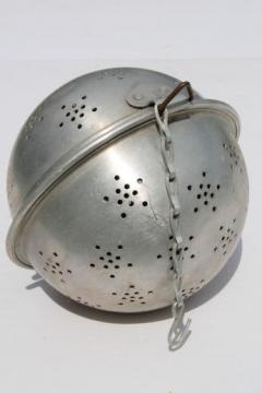 catalog photo of vintage rice ball rice mold made like a giant old metal tea ball / infuser basket