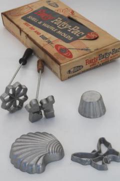 catalog photo of vintage rosette iron timbale patty mold set, cups & patty shell seashells