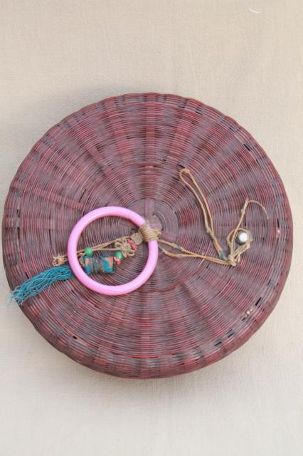 photo of vintage round wicker sewing basket full of spools of colored cotton thread #14