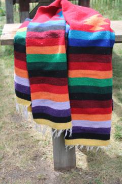 catalog photo of vintage saddle blanket or rug, boho rainbow colors woven striped Mexican blanket, southwest decor
