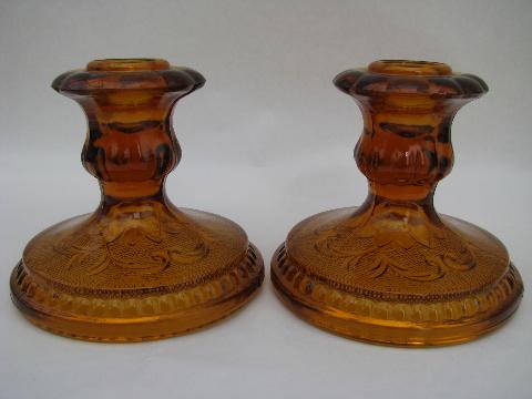 photo of vintage sandwich daisy pattern pressed glass candle sticks, amber #1