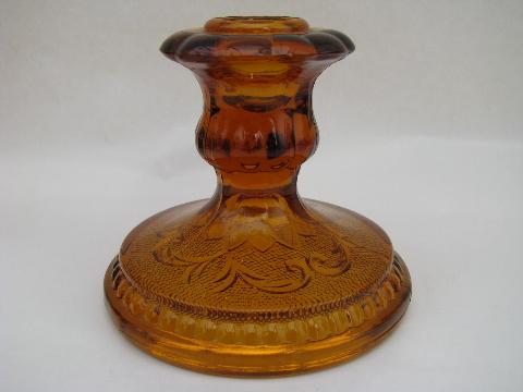 photo of vintage sandwich daisy pattern pressed glass candle sticks, amber #2