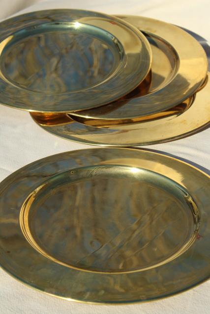 photo of vintage set of four gold charger plates, very heavy solid brass chargers #1