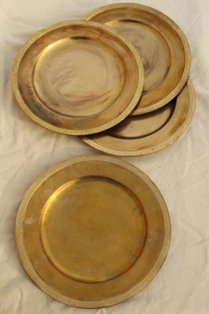 photo of vintage set of four gold charger plates, very heavy solid brass chargers #1