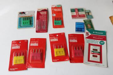 photo of vintage sewing machine needles, old advertising sewing notions counter packages