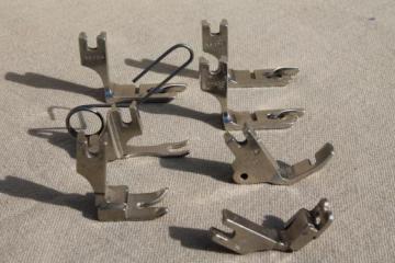 catalog photo of vintage  sewing machine presser feet, rolled hemmers etc. fit Husqvarna Viking 33-10