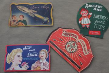 catalog photo of vintage sewing needle books lot, old advertising w/ Raggedy Ann, Space Ship etc.